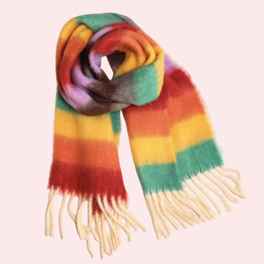 Rainbow striped scarf with fringes on a white background